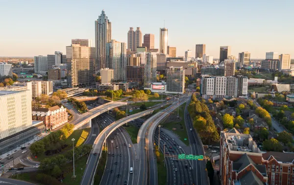 Atlanta's skyline with iconic landmarks like the Mercedes-Benz Stadium.